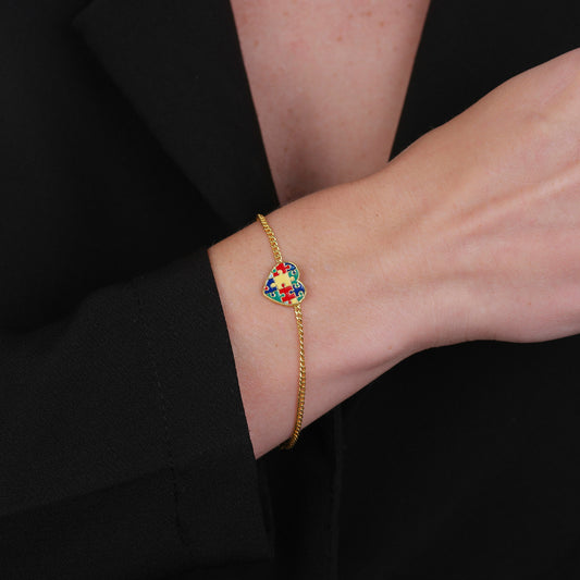 Pulseira Lilith Allure Dourada Autismo Formato Coração. Lilith Allure Gold Autism Awareness Bracelet – Heart-Shaped Design