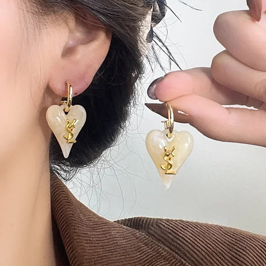 BRINCO SAINT LAURENT VINTAGE CORACAO