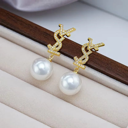 BRINCO CASSANDRE PEARL EARRINGS IN MEL