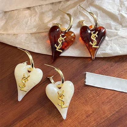 BRINCO SAINT LAURENT VINTAGE CORACAO