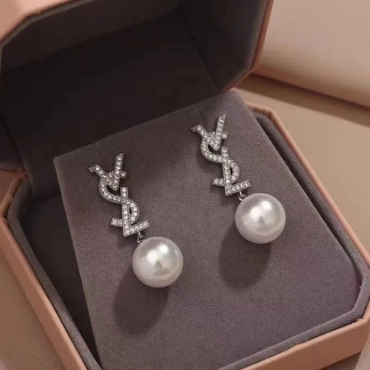 BRINCO CASSANDRE PEARL EARRINGS IN MEL