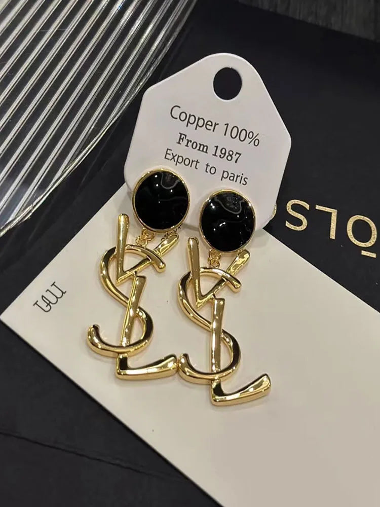 BRINCOS DE CLIPE MONOGRAM