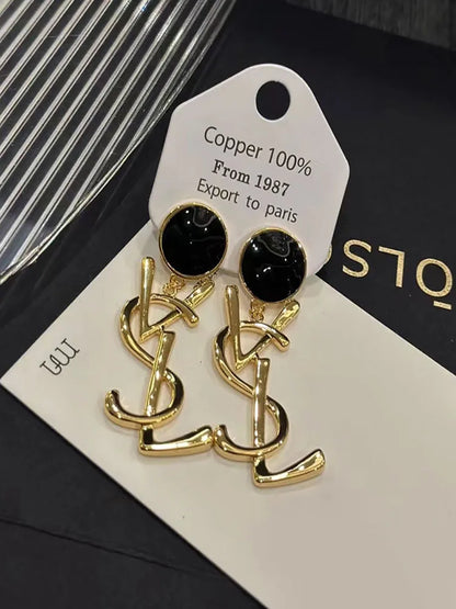 BRINCOS DE CLIPE MONOGRAM