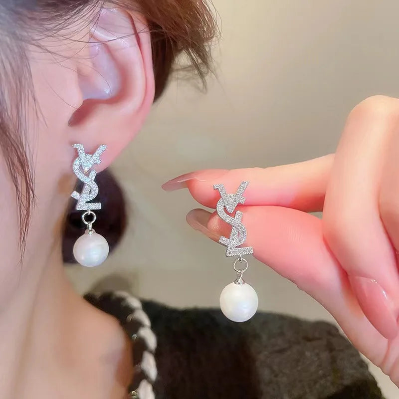 BRINCO CASSANDRE PEARL EARRINGS IN MEL