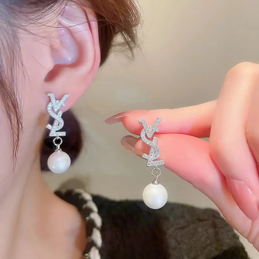 BRINCO CASSANDRE PEARL EARRINGS IN MEL