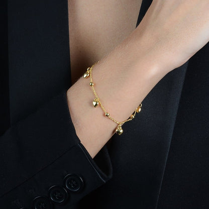 Pulseira Lilith Allure Dourada com Pingentes de Coração e Esferas / Lilith Allure Gold Bracelet with Heart and Bead Charms